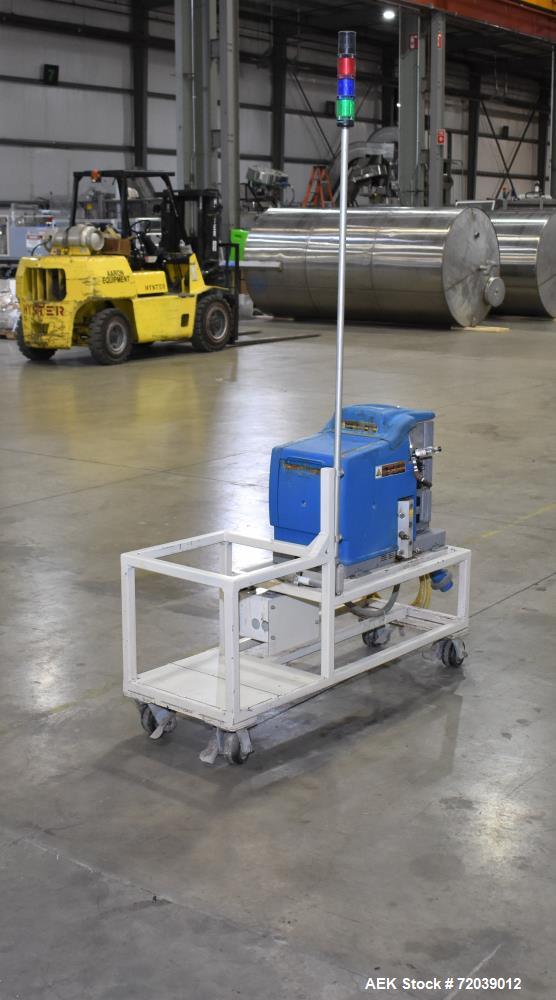 Used Nordson Problue 10 Hot Melt Adhesive Applicator System. Volume 10 liter, melt rate per hour 24 pound, throughput per hour 27.3 pound. Mounted on painted carbon steel frame with casters. Serial# ...